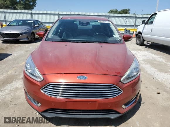 ✅ 2018 Ford Focus Titanium • VIN: 1FADP3J23JL319896 • Lot: 67985565. Wystawiony na Copart z przebiegiem 80 147 mil. Bezpłatny archiwum sprzedaży aukcyjnych z USA i szczegółowy raport historii pojazdu na DreamBid. Zdjęcie 5.