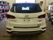 ✅ 2017 Hyundai Santa Fe Ultimate • VIN: 5NMZWDLA4HH042667 • Лот: 62863373. Опубликован ранее на Copart с пробегом 96 426 миль. Бесплатный доступ к архиву аукционных продаж из США и подробный отчёт об истории автомобиля на DreamBid. Изображение 6.