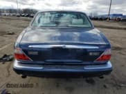 ✅ 2003 Jaguar XJ 8 • VIN: SAJDA14C13LF51313 • Лот: 42750105. Опубликован ранее на Copart с пробегом Не указан. Бесплатный доступ к архиву аукционных продаж из США и подробный отчёт об истории автомобиля на DreamBid. Изображение 6.