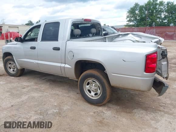 2009 Dodge Dakota ST z VIN 1D7HE28K59S792966, wystawiony jako IAAI lot #42224707 z przebiegiem 211 063 mil mil oraz . Historia ofert i sprzedaży dostępna na DreamBid. Obrazek 3.