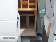 ✅ 2012 Ford Econoline Cargo Recreational • VIN: 1FTNE2EL2CDA46707 • Lot: 42911288. Wystawiony na IAAI z przebiegiem 206 809 mil. Bezpłatny archiwum sprzedaży aukcyjnych z USA i szczegółowy raport historii pojazdu na DreamBid. Zdjęcie 8.