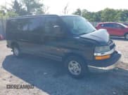 ✅ 2005 Chevrolet Express Passenger • VIN: 1GNFG15T751169844 • Lot: 42393893. Listed on IAAI with 226,673 mi. Free auction sales archive from the USA and detailed vehicle history report at DreamBid. Image 1.