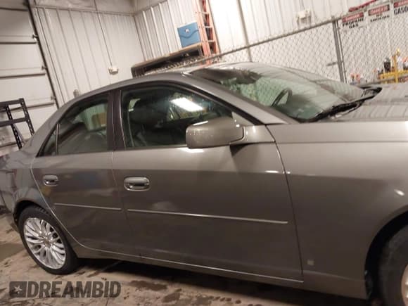 ✅ 2006 Cadillac CTS • VIN: 1G6DM57T860100264 • Лот: 41699855. Опубликован ранее на IAAI с пробегом 93 165 миль. Бесплатный доступ к архиву аукционных продаж из США и подробный отчёт об истории автомобиля на DreamBid. Изображение 14.