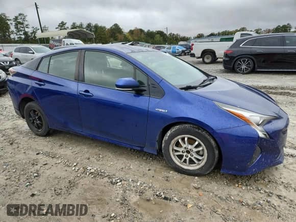 2018 Toyota Prius Two z VIN JTDKBRFU3J3595637, wystawiony jako Copart lot #90105975 z przebiegiem 257 844 mil mil oraz Czysty tytuł • Clean title. Historia ofert i sprzedaży dostępna na DreamBid. Obrazek 4.