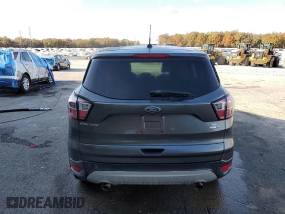 ✅ 2017 Ford Escape SE • VIN: 1FMCU9G95HUC99057 • Lot: 92036075. Listed on Copart with 126,082 mi. Free auction sales archive from the USA and detailed vehicle history report at DreamBid. Image 6.