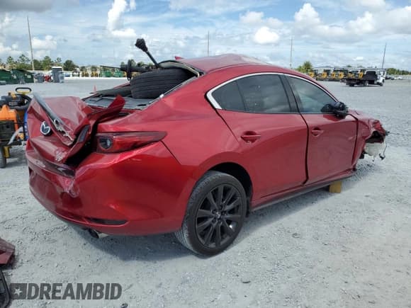 ✅ 2023 Mazda 3 Premium Plus • VIN: 3MZBPBEY7PM374396 • Лот: 85922525. Опубликован ранее на Copart с пробегом 51 320 миль. Бесплатный доступ к архиву аукционных продаж из США и подробный отчёт об истории автомобиля на DreamBid. Изображение 3.