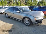 ✅ 2012 Audi A8 • VIN: WAURVAFD2CN016861 • Lot: 52667165. Listed on Copart with 101,793 mi. Free auction sales archive from the USA and detailed vehicle history report at DreamBid. Image 4.