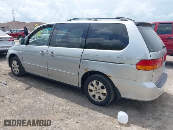 ✅ 2003 Honda Odyssey EX-L • VIN: 5FNRL18073B030644 • Лот: 42746830. Опубликован ранее на IAAI с пробегом 331 047 миль. Бесплатный доступ к архиву аукционных продаж из США и подробный отчёт об истории автомобиля на DreamBid. Изображение 3.