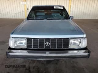 ✅ 1990 Plymouth Horizon • VIN: 1P3XL18D3LC706868 • Lot: 84697704. Wystawiony na Copart z przebiegiem 98 633 mil. Bezpłatny archiwum sprzedaży aukcyjnych z USA i szczegółowy raport historii pojazdu na DreamBid. Zdjęcie 5.