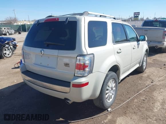 ✅ 2009 Mercury Mariner Premier • VIN: 4M2CU87G69KJ11232 • Lot: 41761605. Wystawiony na IAAI z przebiegiem 63 239 mil. Bezpłatny archiwum sprzedaży aukcyjnych z USA i szczegółowy raport historii pojazdu na DreamBid. Zdjęcie 4.