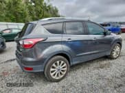 ✅ 2017 Ford Escape Titanium • VIN: 1FMCU0JDXHUD16122 • Lot: 95988025. Wystawiony na Copart z przebiegiem 63 513 mil. Bezpłatny archiwum sprzedaży aukcyjnych z USA i szczegółowy raport historii pojazdu na DreamBid. Zdjęcie 3.