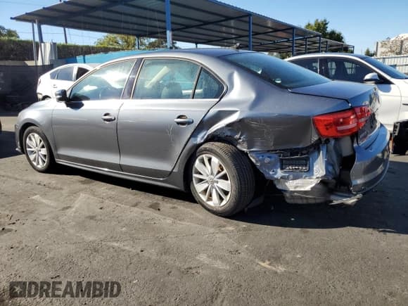 ✅ 2015 Volkswagen Jetta SE • VIN: 3VWD17AJ7FM268058 • Lot: 85205095. Listed on Copart with 64,778 mi. Free auction sales archive from the USA and detailed vehicle history report at DreamBid. Image 2.