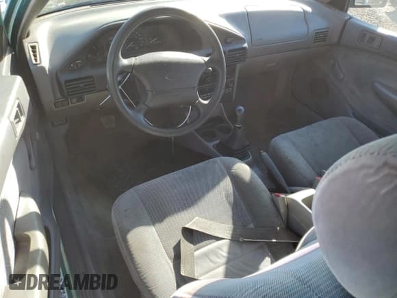 ✅ 1995 Ford Escort • VIN: 3FASP11J4SR216881 • Lot: 82966474. Listed on Copart with 172,397 mi. Free auction sales archive from the USA and detailed vehicle history report at DreamBid. Image 8.