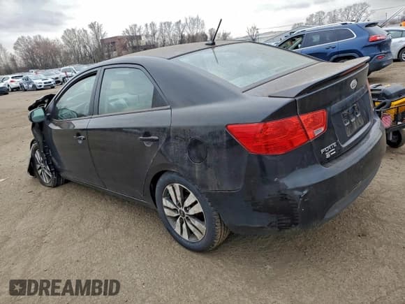 ✅ 2013 Kia Forte EX • VIN: KNAFU4A2XD5721003 • Лот: 93836505. Опубликован ранее на Copart с пробегом Не указан. Бесплатный доступ к архиву аукционных продаж из США и подробный отчёт об истории автомобиля на DreamBid. Изображение 2.