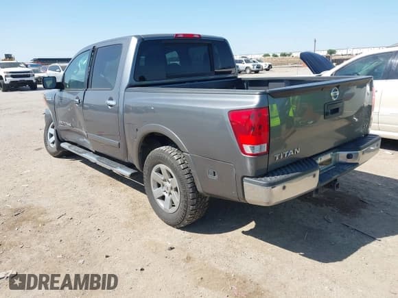 ✅ 2015 Nissan Titan SV • VIN: 1N6BA0ED5FN508975 • Lot: 42032737. Listed on IAAI with 97,432 mi. Free auction sales archive from the USA and detailed vehicle history report at DreamBid. Image 3.