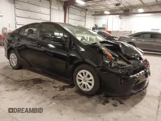 ✅ 2022 Toyota Prius L Eco • VIN: JTDKAMFU6N3189315 • Lot: 43616635. Listed on IAAI with 67,156 mi. Free auction sales archive from the USA and detailed vehicle history report at DreamBid. Image 1.