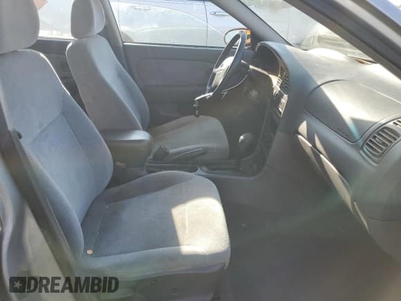 ✅ 2001 Kia Sephia • VIN: KNAFB121715014673 • Лот: 71712174. Опубликован ранее на Copart с пробегом 83 277 миль. Бесплатный доступ к архиву аукционных продаж из США и подробный отчёт об истории автомобиля на DreamBid. Изображение 7.