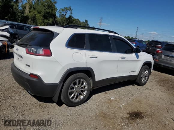 ✅ 2022 Jeep Cherokee Latitude Lux • VIN: 1C4PJLMX8ND519785 • Lot: 82489845. Listed on Copart with 9,909 mi. Free auction sales archive from the USA and detailed vehicle history report at DreamBid. Image 3.
