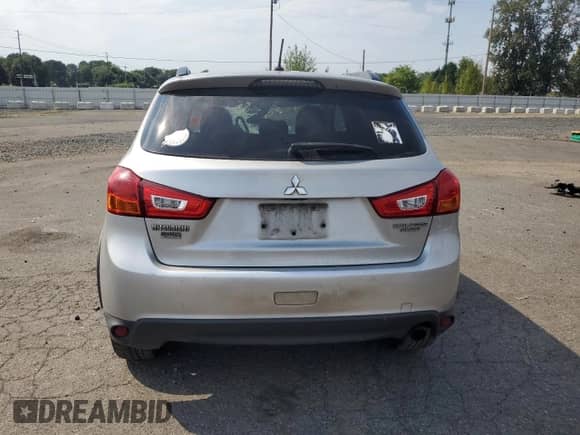 2013 Mitsubishi Outlander LE with VIN 4A4AR5AU1DE022535, listed as a Copart auction lot 70002895 with 297,561 mi miles and Salvage title. Bid and sale history available at DreamBid. Image 6.