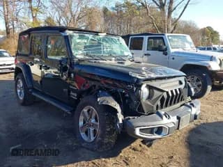 ✅ 2021 Jeep Wrangler Unlimited Sahara • VIN: 1C4HJXEN4MW714133 • Lot: 41241040. Listed on IAAI with 82,247 mi. Free auction sales archive from the USA and detailed vehicle history report at DreamBid. Image 1.