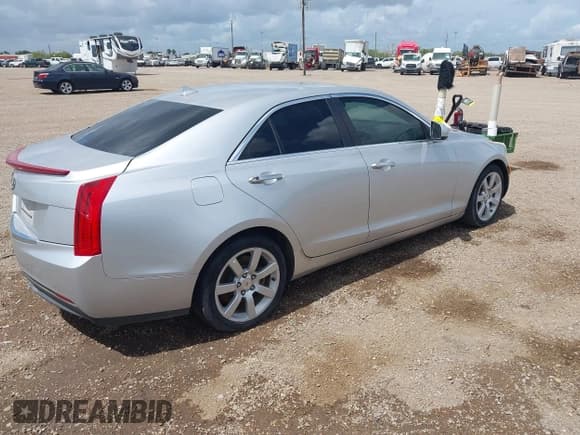 ✅ 2014 Cadillac ATS Standard RWD • VIN: 1G6AA5RA1E0104839 • Lot: 42383432. Wystawiony na IAAI z przebiegiem 142 701 mil. Bezpłatny archiwum sprzedaży aukcyjnych z USA i szczegółowy raport historii pojazdu na DreamBid. Zdjęcie 4.