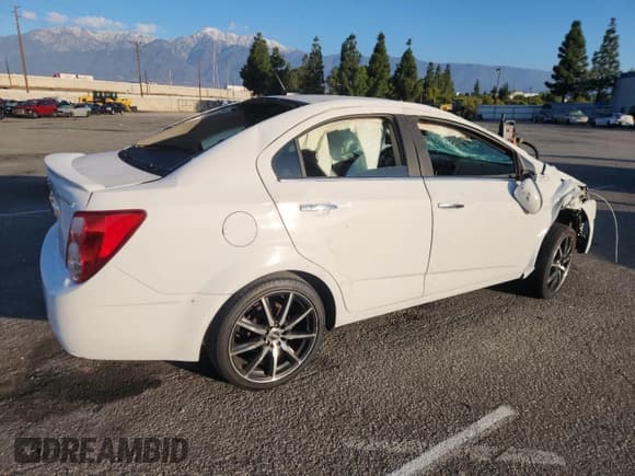 ✅ 2014 Chevrolet Sonic LTZ • VIN: 1G1JE5SG1E4127653 • Lot: 93331635. Listed on Copart with Not provided. Free auction sales archive from the USA and detailed vehicle history report at DreamBid. Image 3.