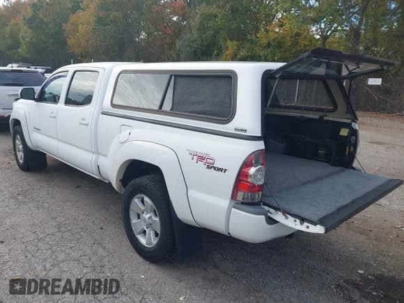 ✅ 2013 Toyota Tacoma • VIN: 3TMMU4FNXDM060144 • Lot: 43382954. Listed on IAAI with 138,717 mi. Free auction sales archive from the USA and detailed vehicle history report at DreamBid. Image 3.