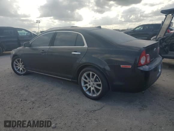 ✅ 2012 Chevrolet Malibu LTZ • VIN: 1G1ZG5E72CF293321 • Lot: 79355424. Listed on Copart with 185,569 mi. Free auction sales archive from the USA and detailed vehicle history report at DreamBid. Image 2.