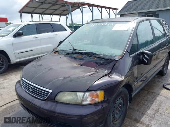 ✅ 1997 Honda Odyssey • VIN: JHMRA1842VC003410 • Lot: 42456828. Listed on IAAI with 280,657 mi. Free auction sales archive from the USA and detailed vehicle history report at DreamBid. Image 6.