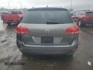 ✅ 2014 Volkswagen Touareg Sport • VIN: WVGEF9BPXED006404 • Лот: 83981945. Опубликован ранее на Copart с пробегом Не указан. Бесплатный доступ к архиву аукционных продаж из США и подробный отчёт об истории автомобиля на DreamBid. Изображение 6.