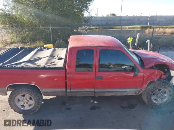 1997 Chevrolet Silverado 1500 z VIN 2GCEK19R5V1290268, wystawiony jako IAAI lot #43485965 z przebiegiem 192 915 mil mil oraz . Historia ofert i sprzedaży dostępna na DreamBid. Obrazek 13.