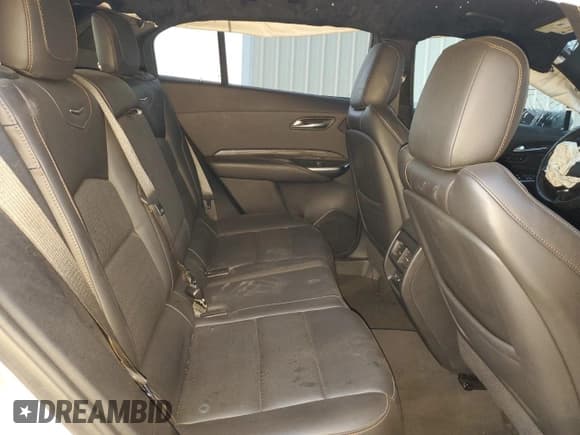 ✅ 2021 Cadillac XT4 AWD Sport • VIN: 1GYFZFR46MF043456 • Лот: 83324124. Опубликован ранее на Copart с пробегом 59 785 миль. Бесплатный доступ к архиву аукционных продаж из США и подробный отчёт об истории автомобиля на DreamBid. Изображение 10.