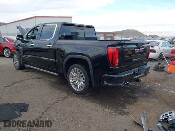 ✅ 2019 GMC Sierra 1500 Denali • VIN: 1GTU9FEL0KZ302500 • Лот: 43504711. Опубликован ранее на IAAI с пробегом 76 691 миль. Бесплатный доступ к архиву аукционных продаж из США и подробный отчёт об истории автомобиля на DreamBid. Изображение 3.