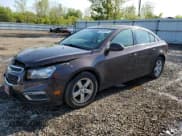 ✅ 2015 Chevrolet Cruze LT • VIN: 1G1PC5SB5F7137882 • Lot: 49864433. Listed on Copart with 134,667 mi. Free auction sales archive from the USA and detailed vehicle history report at DreamBid. Image 1.