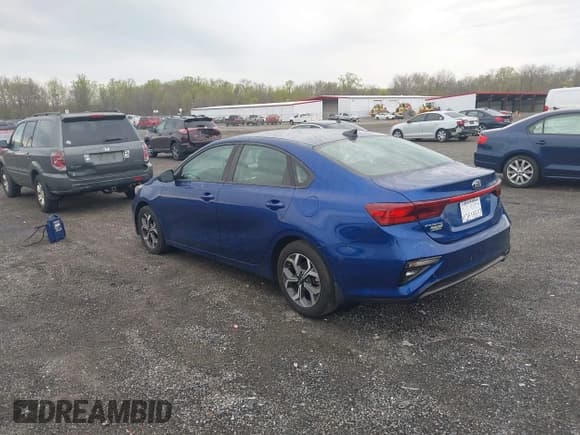 ✅ 2019 Kia Forte LXS • VIN: 3KPF24AD6KE041448 • Lot: 42035571. Listed on IAAI with 128,536 mi. Free auction sales archive from the USA and detailed vehicle history report at DreamBid. Image 3.