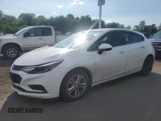 ✅ 2018 Chevrolet Cruze LT • VIN: 3G1BE6SM8JS570618 • Lot: 63690245. Listed on Copart with 135,712 mi. Free auction sales archive from the USA and detailed vehicle history report at DreamBid. Image 1.
