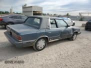 ✅ 1986 Chrysler LeBaron • VIN: 1C3BC56K7GF174844 • Lot: 69862575. Listed on Copart with 35,226 mi. Free auction sales archive from the USA and detailed vehicle history report at DreamBid. Image 3.