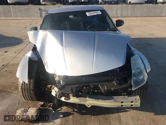 ✅ 2005 Nissan 350Z • VIN: JN1AZ34D05M605342 • Лот: 69046905. Опубликован ранее на Copart с пробегом 84 516 миль. Бесплатный доступ к архиву аукционных продаж из США и подробный отчёт об истории автомобиля на DreamBid. Изображение 13.