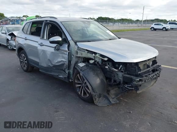 ✅ 2023 Volkswagen Tiguan S • VIN: 3VVRB7AX2PM054656 • Lot: 43660280. Listed on IAAI with 38,934 mi. Free auction sales archive from the USA and detailed vehicle history report at DreamBid. Image 1.