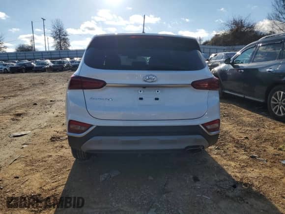 2019 Hyundai Santa Fe SE z VIN 5NMS23AD1KH102433, wystawiony jako Copart lot #71176022 z przebiegiem 70 051 mil mil oraz . Historia ofert i sprzedaży dostępna na DreamBid. Obrazek 6.