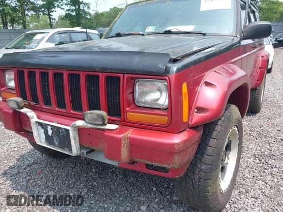 ✅ 1999 Jeep Cherokee Sport • VIN: 1J4FF68S2XL591291 • Lot: 42430037. Listed on IAAI with 329,792 mi. Free auction sales archive from the USA and detailed vehicle history report at DreamBid. Image 6.