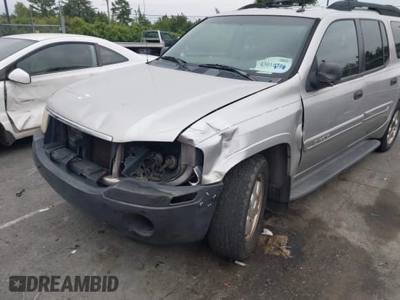✅ 2004 GMC Envoy SLE • VIN: 1GKES16S746136499 • Lot: 43016716. Listed on IAAI with 306,631 mi. Free auction sales archive from the USA and detailed vehicle history report at DreamBid. Image 6.
