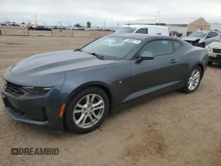 ✅ 2019 Chevrolet Camaro 1LS • VIN: 1G1FB1RXXK0119700 • Lot: 85003715. Listed on Copart with 59,896 mi. Free auction sales archive from the USA and detailed vehicle history report at DreamBid. Image 1.