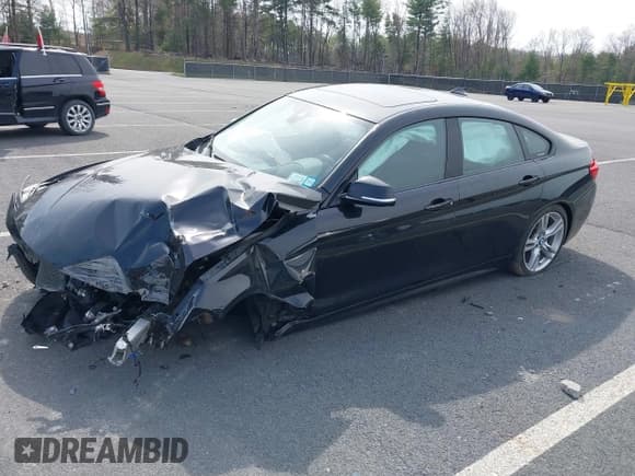 ✅ 2015 BMW 4 Series 435i xDrive • VIN: WBA4B3C55FGV48934 • Lot: 42098843. Listed on IAAI with 89,959 mi. Free auction sales archive from the USA and detailed vehicle history report at DreamBid. Image 16.