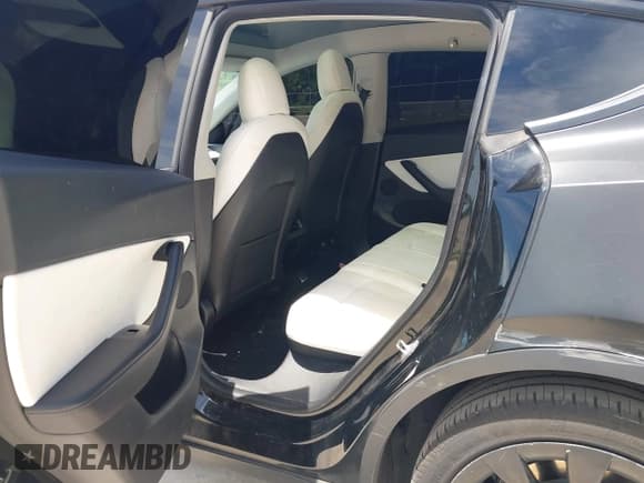 ✅ 2021 Tesla Model Y Standard Range • VIN: 5YJYGDED7MF103893 • Lot: 42892555. Listed on IAAI with 102,946 mi. Free auction sales archive from the USA and detailed vehicle history report at DreamBid. Image 8.