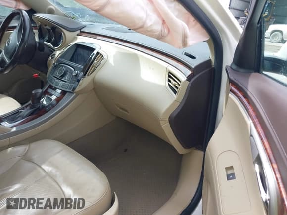 ✅ 2013 Buick LaCrosse Premium 2 • VIN: 1G4GH5E39DF129375 • Lot: 41741851. Wystawiony na IAAI z przebiegiem 124 404 mil. Bezpłatny archiwum sprzedaży aukcyjnych z USA i szczegółowy raport historii pojazdu na DreamBid. Zdjęcie 5.