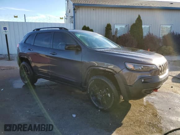 ✅ 2022 Jeep Cherokee Trailhawk • VIN: 1C4PJMBX8ND532139 • Lot: 87020215. Listed on Copart with 30,875 mi. Free auction sales archive from the USA and detailed vehicle history report at DreamBid. Image 4.