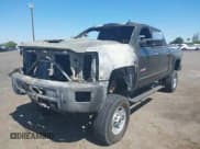 ✅ 2016 Chevrolet Silverado 2500HD LTZ • VIN: 1GC1KWE87GF227676 • Lot: 42489389. Listed on IAAI with Not provided. Free auction sales archive from the USA and detailed vehicle history report at DreamBid. Image 2.