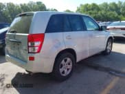 ✅ 2012 Suzuki Grand Vitara Premium • VIN: JS3TE0D67C4100186 • Lot: 42862856. Listed on IAAI with 133,573 mi. Free auction sales archive from the USA and detailed vehicle history report at DreamBid. Image 4.