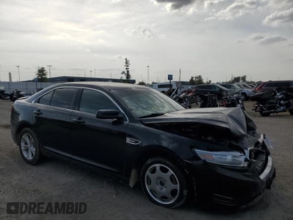 ✅ 2013 Ford Taurus SEL • VIN: 1FAHP2E88DG164656 • Лот: 84429605. Опубликован ранее на Copart с пробегом 186 907 миль. Бесплатный доступ к архиву аукционных продаж из США и подробный отчёт об истории автомобиля на DreamBid. Изображение 4.